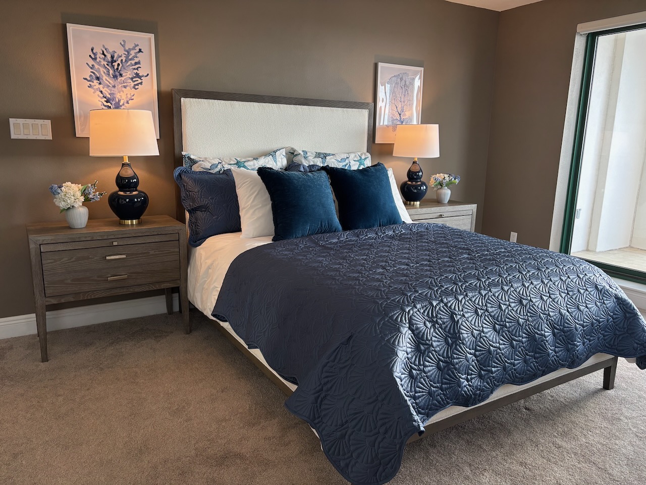 Elegant bedroom with navy blue bedding
